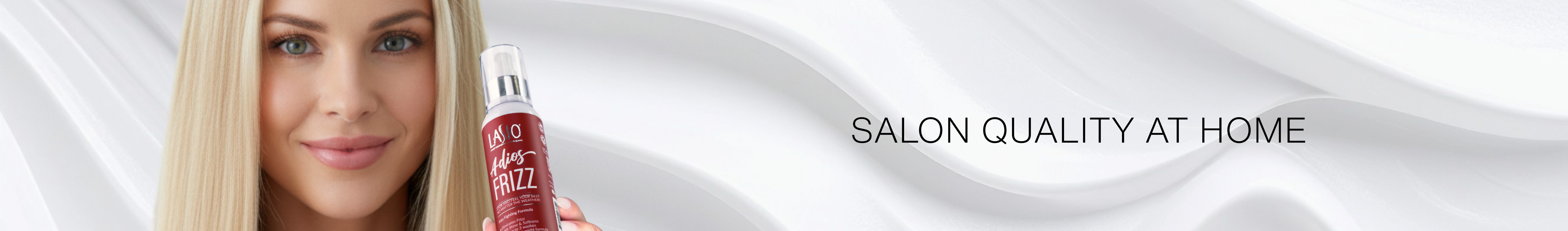 Adios Frizz bottle on a red heel